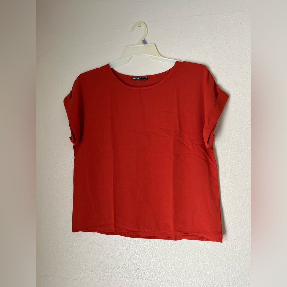 Women’s red blouse flowy